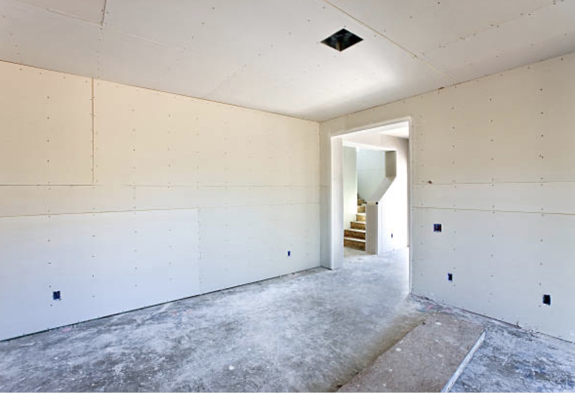 Aesthetic Construction crew finishing a drywall project in the Portland metro area