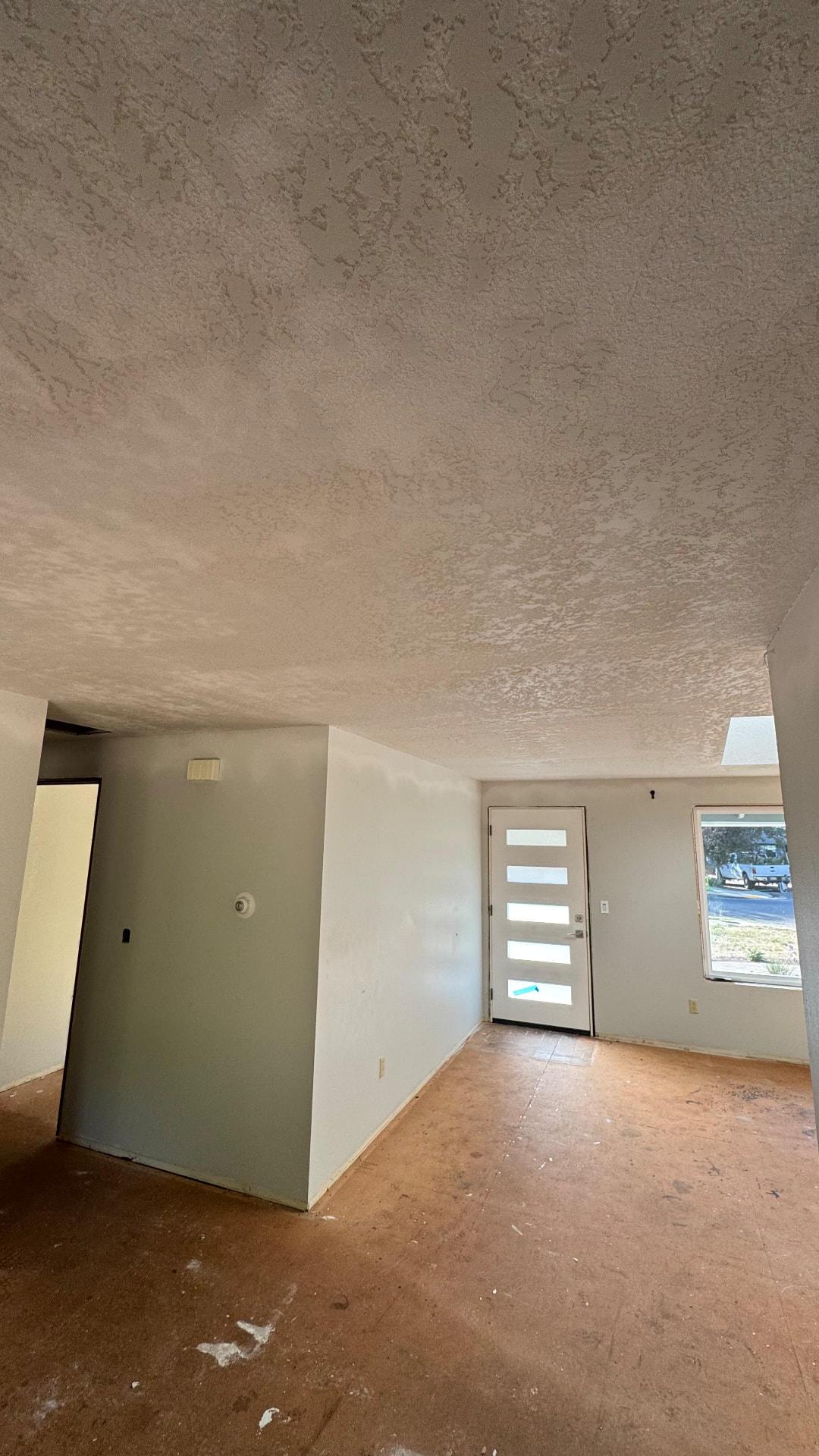 Before and after drywall finishing and ceiling work by Aesthetic Construction in Portland Metro, Oregon. After.